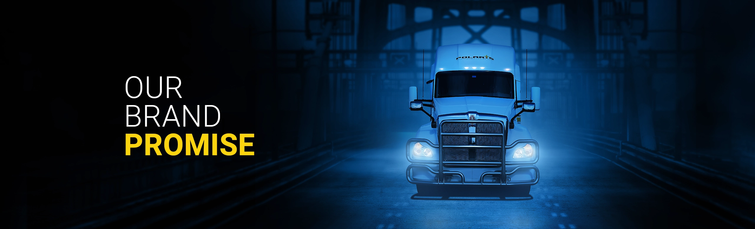 Front view of Polaris highway truck transporting LTL shipment across international Canada & USA bridge
